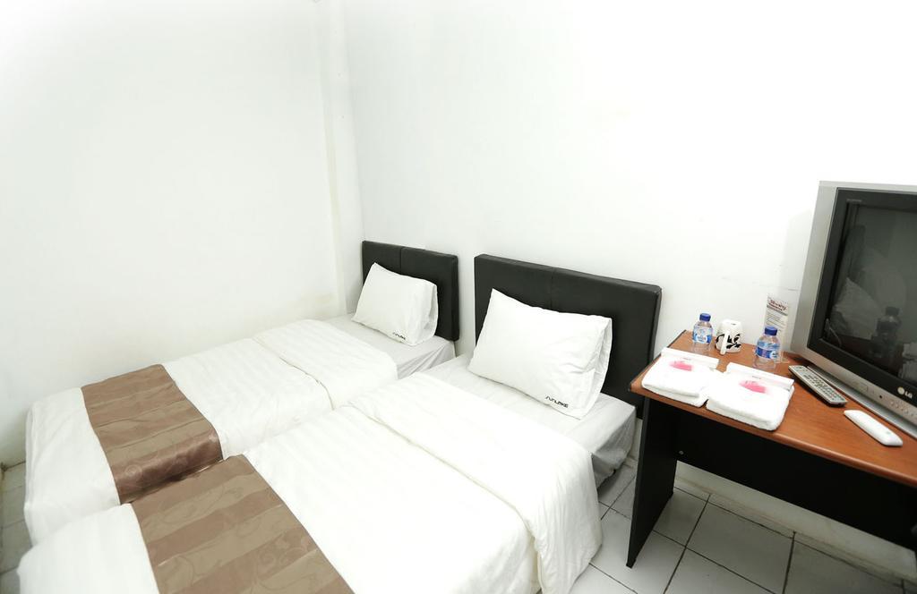 Hotel Ds Colive Siliwangi Semarang Habitación foto